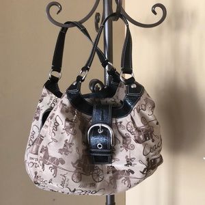 Coach pocketbook with large buckle